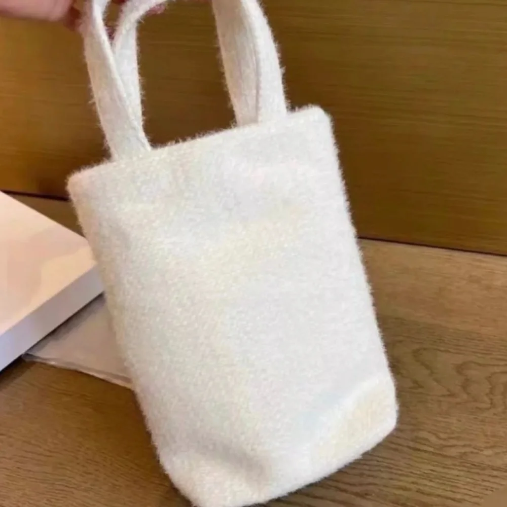 Chanel Beauté Soft Knit
Snow Metallic Mini Tote! - Picture 3 of 12